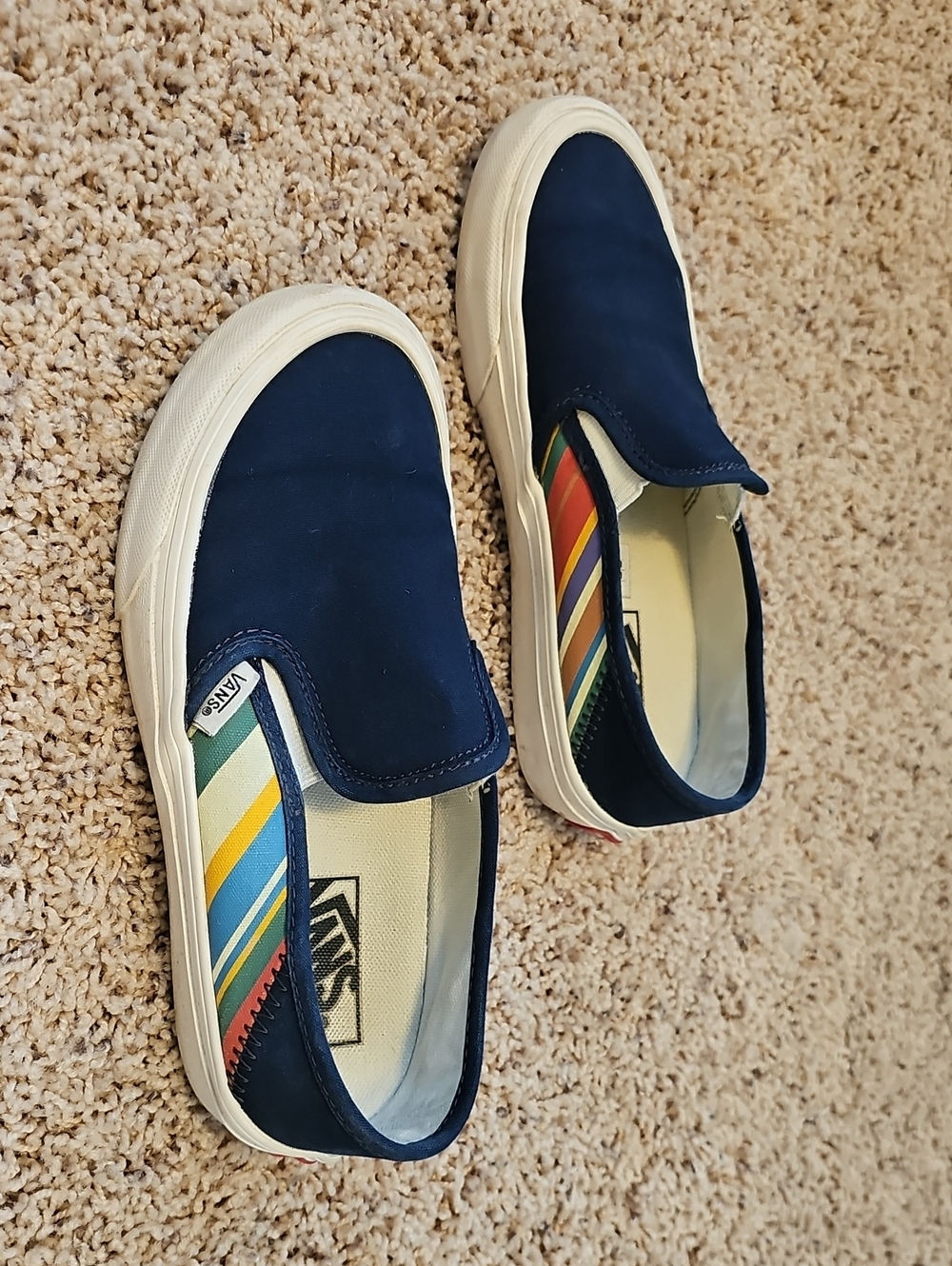 Vans Slip-On Sneakers in Navy with Multicolor Stripe